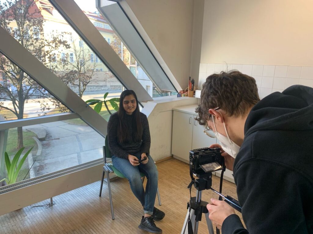 HOTZYMES video shooting! Anisha from TU Graz is explaining her work in our FETOPEN project team. She shows how a cascadic enzyme reaction can be realized with the help of magnetic nanoparticles in a bioreactor with alternating magnetic field.